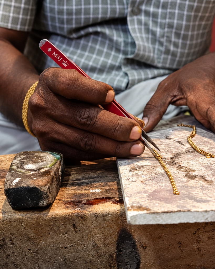 MSJ Master Goldsmith handcrafting jewellery with branded tools